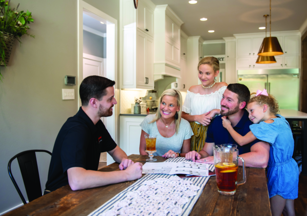 setting at the table looking brochure -a552845 setting at the table looking brochure -a552845